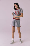 Full body view of the Chaser Ringer Shorts in Heather Grey with Crimson trim styled with the matching Pickleball Club Tee