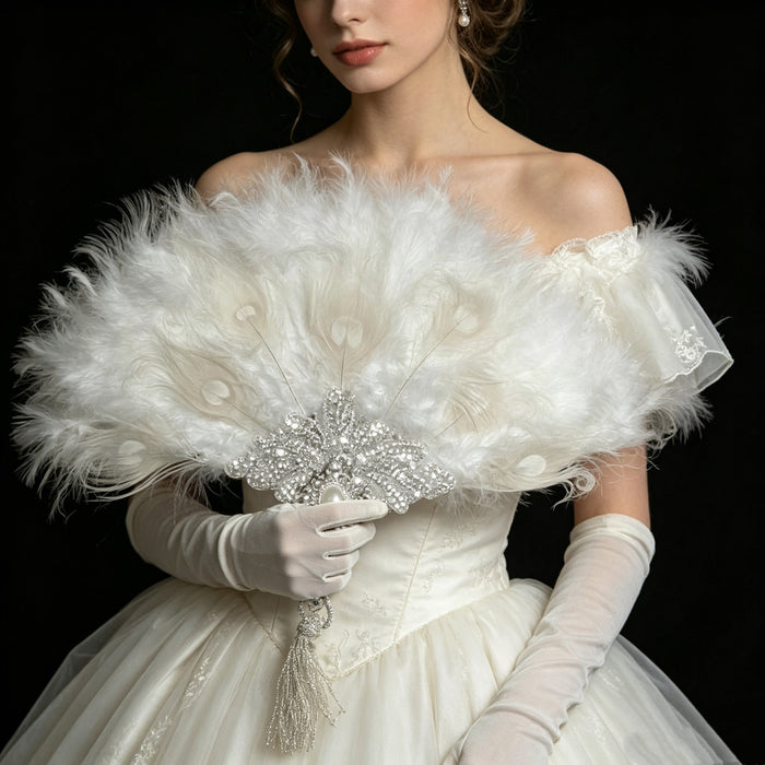 Handcrafted Rococo bridal fan with white feathers, pearl beads, sequins and Victorian inspired details for wedding and vintage events.
