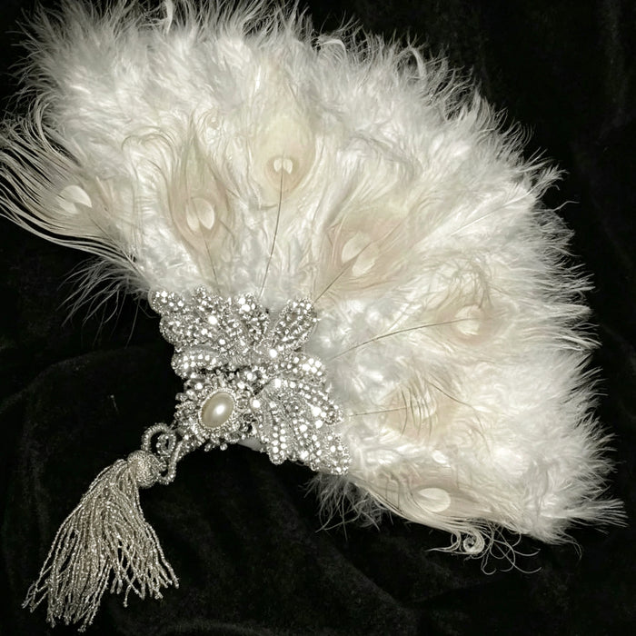 Handcrafted Rococo bridal fan with white feathers, pearl beads, sequins and Victorian inspired details for wedding and vintage events.