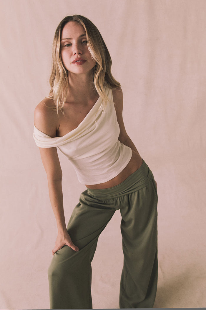 Chaser Roxanne Starry White Tank shown in a full body angled pose styled with olive wide leg pants