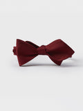 Ruby silk diamond-point bow tie, pre-tied, front view on a grey background