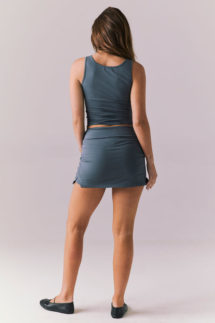 Chaser Rue Future Gray Skort full body back view styled with the matching Lander Future Grey Tank and black flats