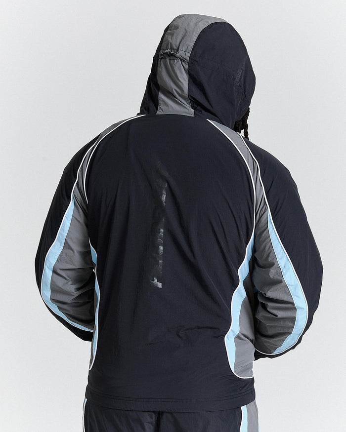 Black and gray jacket with blue accents on a white background