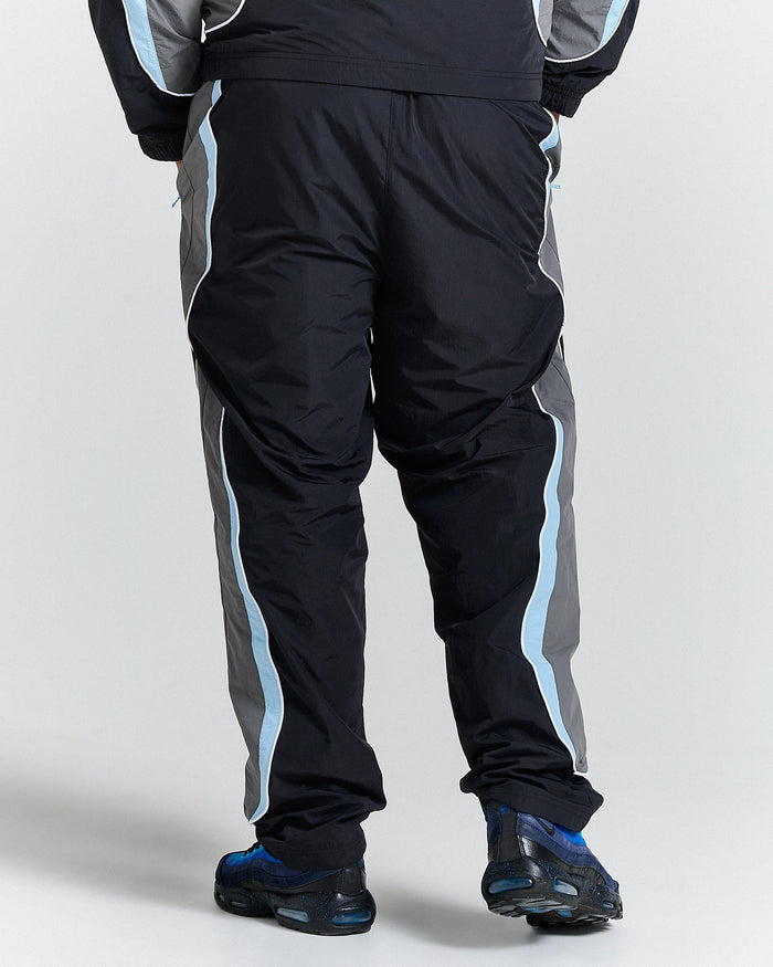 Black and gray tracksuit with blue stripes on a white background