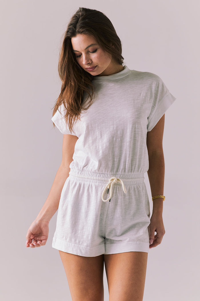 Front view of the Chaser Sanremo White Romper with a relaxed waist and rolled sleeves
