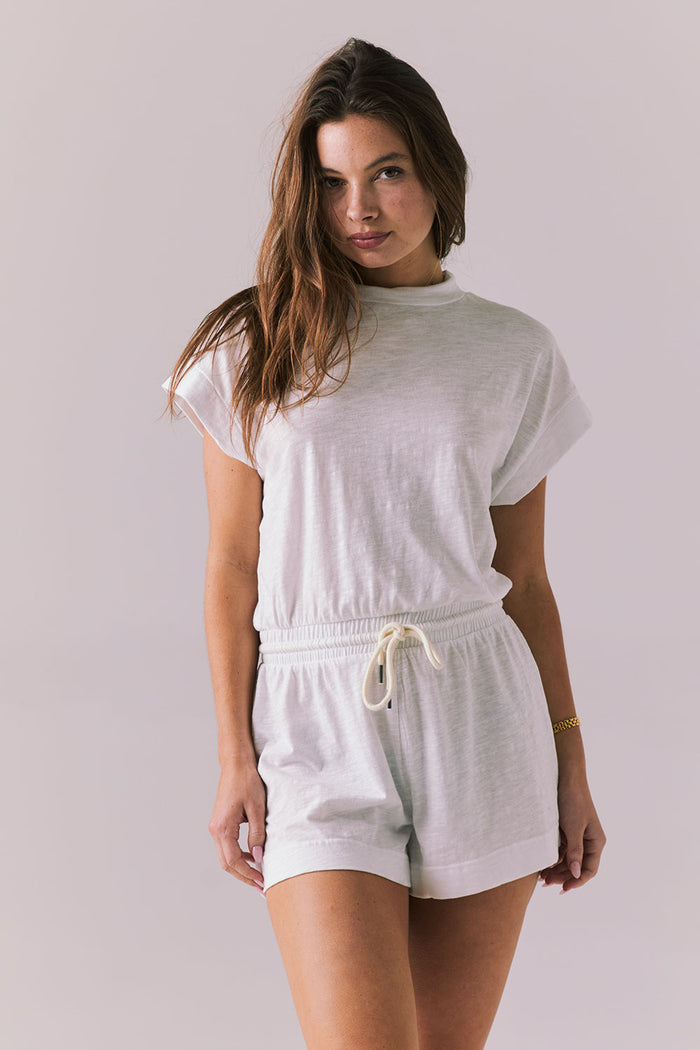 Cropped front portrait view of the Chaser Sanremo White Romper showing the rolled sleeve detail
