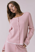 Chaser Seaport Pink Salt cardigan worn buttoned with matching Sailor Pink Salt joggers visible at the waist