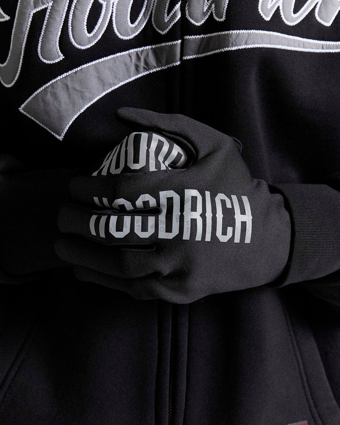 Displays the model wearing the Black 'Hoodrich' branded Shade Gloves