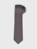 Mauve-grey silk tie, rolled, on light grey background