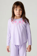 Front view of a girl wearing the Chaser Shocking Love Girls Tee on a neutral background with matching purple shirt