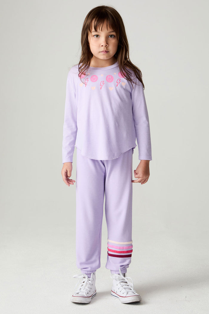 A full body front view of a girl wearing the Chaser Shocking Love Girls Tee on a neutral background