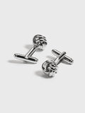Polished silver knot-shaped cufflinks, pair on grey background