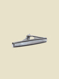 Silver tie bar with mother-of-pearl inlay and milgrain trim on cream background