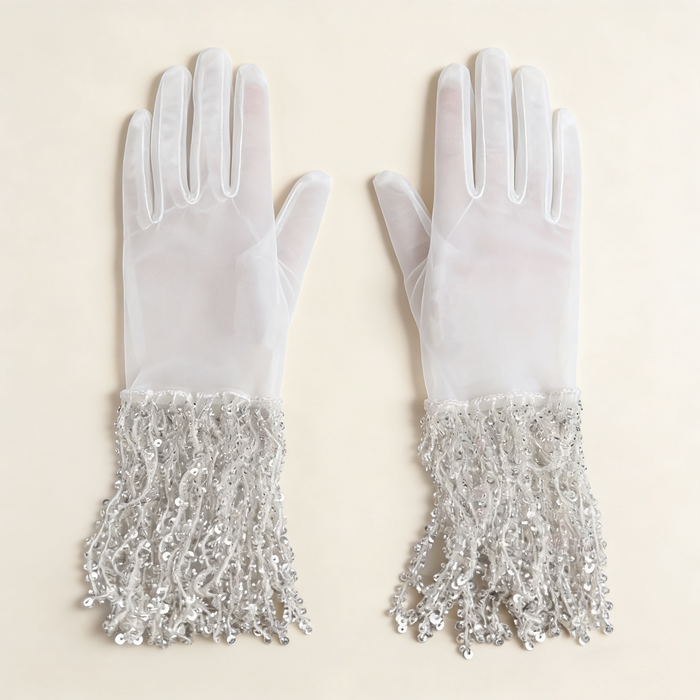 Silver sequin fringe bridal gloves with sheer fabric and sparkling tassel cuffs for wedding ceremony and evening styling.