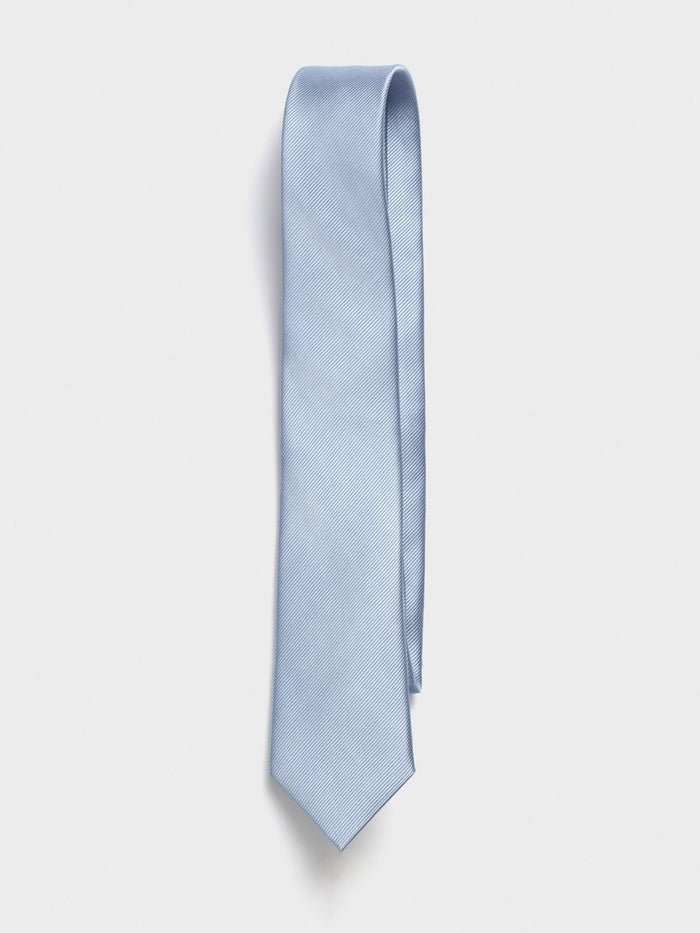 Sky blue silk tie, folded straight with loop at top, on light grey background