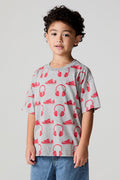 Front view of a boy wearing the Chaser Sneaks and Headphones Tee on a neutral background