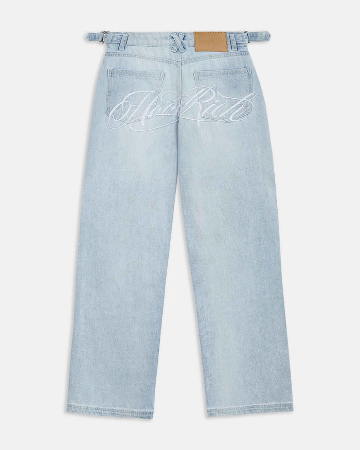 Light blue jeans with 'Hoodrich' embroidery on a white background