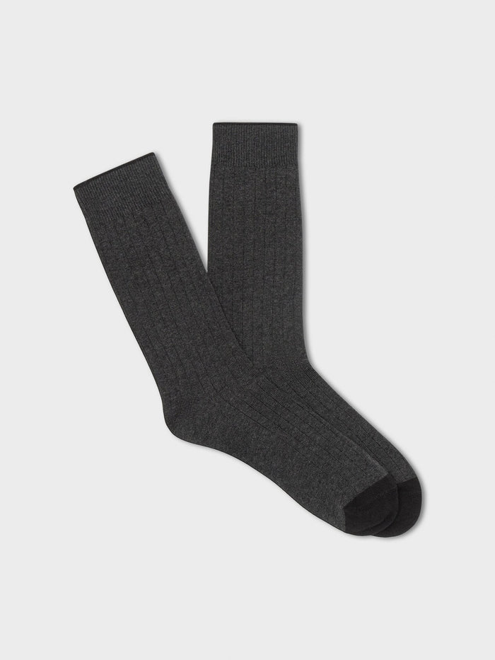 Pair of charcoal ribbed dress socks with black toe, folded flat on light grey background