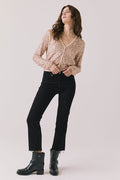 Full body view of woman wearing Chaser’s Sparrow Bronze Brown Long Sleeve button-up with black pants and black boots on a white background