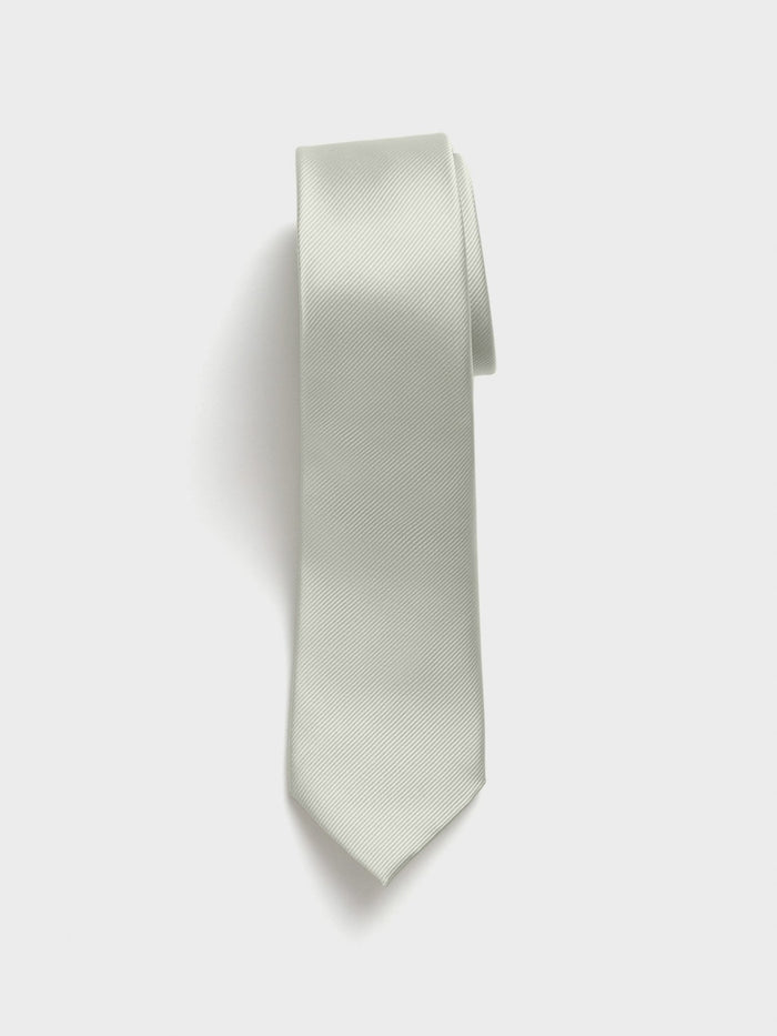 Spearmint silk tie with twill texture, hanging vertically against a white background