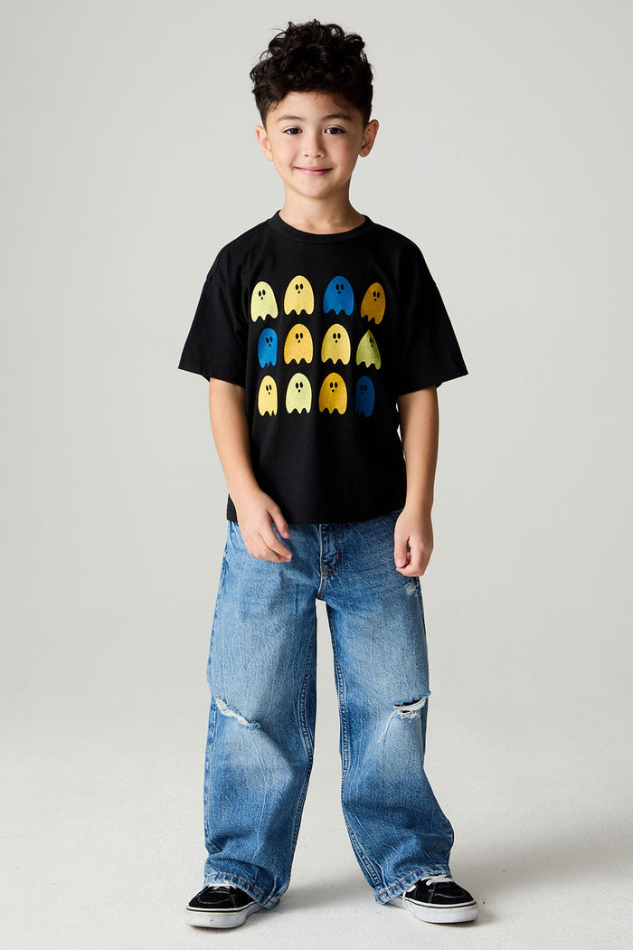 A full body front view of a boy wearing the Chaser Spooky Friends Boys Tee on a neutral background