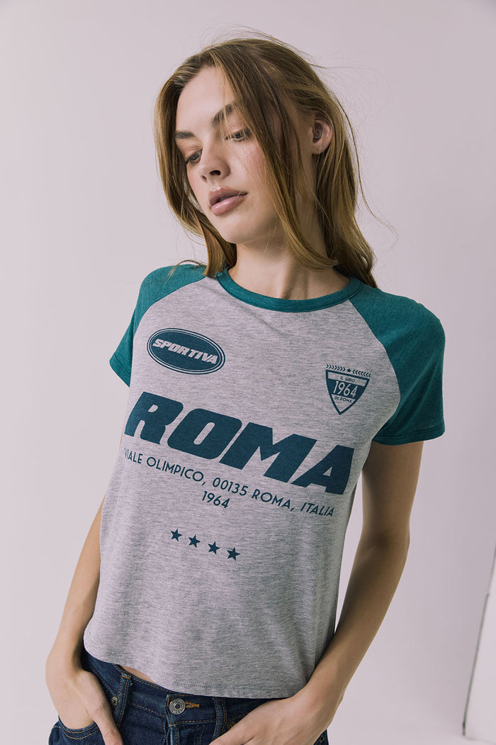 Waist-up view of the Chaser Sportiva Heather Grey Tee highlighting the Roma graphic and relaxed fit
