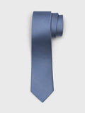 Steel blue silk tie with twill texture, rolled at top on light grey background