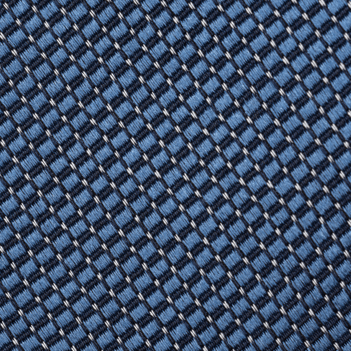 Close-up of steel blue necktie fabric with a woven pindot texture