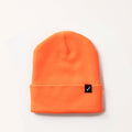 The Stretch Cuff Beanie- Hunter Orange is a vibrant acrylic beanie with a folded brim and a small black tag featuring a white logo on the front, displayed against a plain light background.