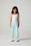 Full body front view of a girl wearing the Chaser   Stripes for Days Pants on a neutral background