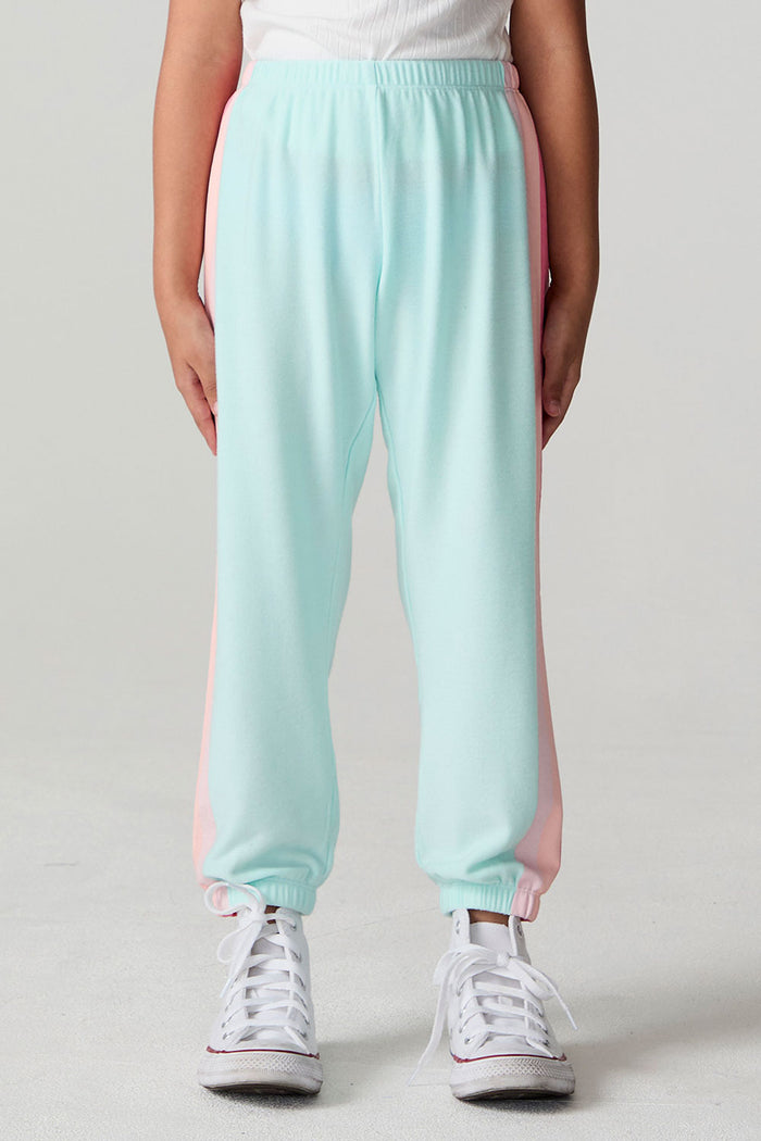 Front view of a girl wearing the Chaser   Stripes for Days Pants on a neutral background