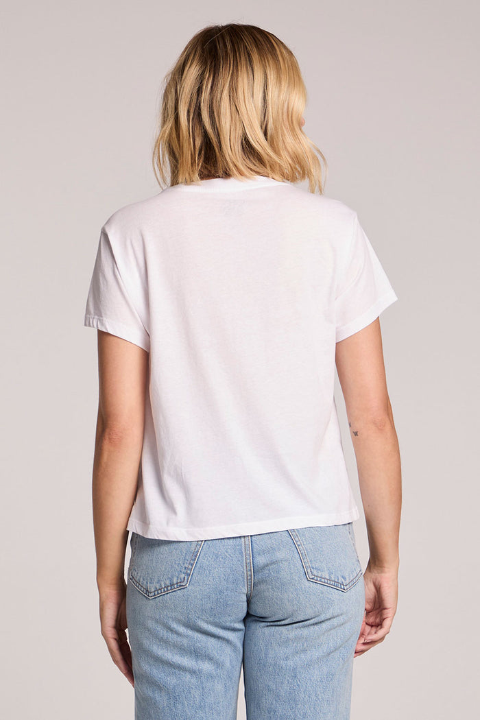 Back view of a woman wearing the Chaser  Sun Records Rock & Roll King Collage on a neutral background