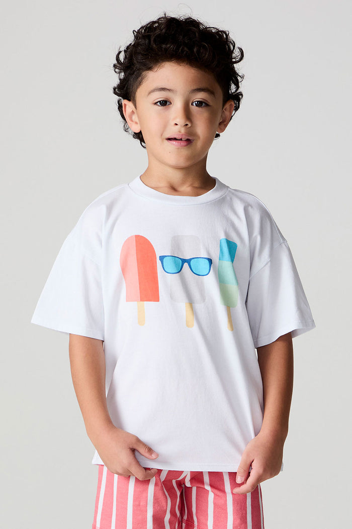 Front view of a boy wearing the Chaser Sunglass Pop Tee  on a neutral background