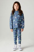 Full body front view of a girl wearing the Chaser Super Star Girls Joggers on a neutral background with matching top