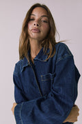 Mid-body front view of the Chaser Sutton Indigo Wash Jacket featuring a zip-front closure and chest pocket detail