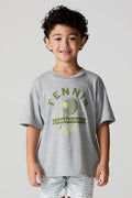 Front view of a boy wearing the Chaser Tennis Club Tee on a neutral background