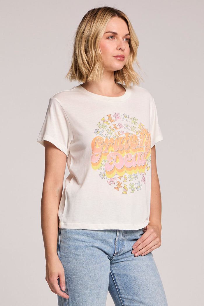 Front view of a woman wearing the Chaser Grateful Dead Dancing Bears Tee on a neutral background with her hand in her pocket