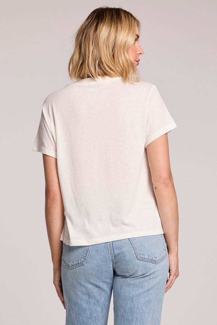 Back view of a woman wearing the Chaser Grateful Dead Dancing Bears Tee on a neutral background