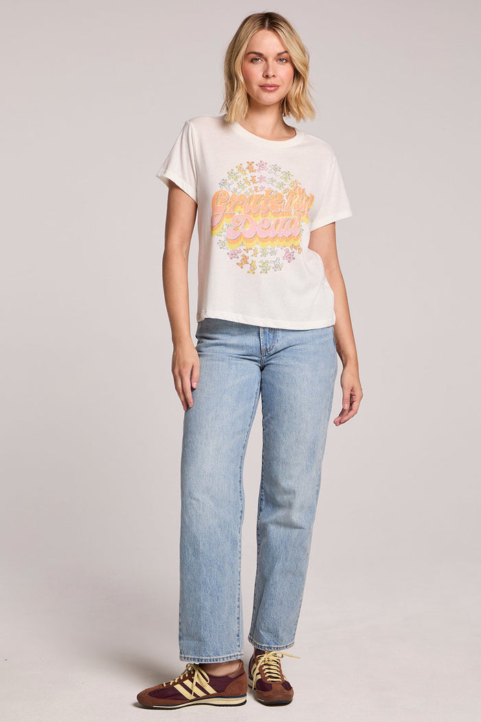 Full body front view of a woman wearing the Chaser Grateful Dead Dancing Bears Tee and sneakers on a neutral background