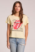 Front view of a woman wearing the Chaser  Rolling Stones Logo Magazine Mix Tee and jeans on a neutral background with hands at her side