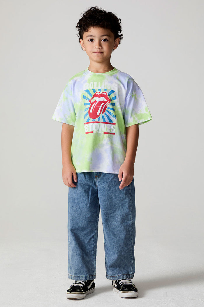 Full body front view of a boy wearing the Chaser The Rolling Stones Tie Dye Tee on a neutral background