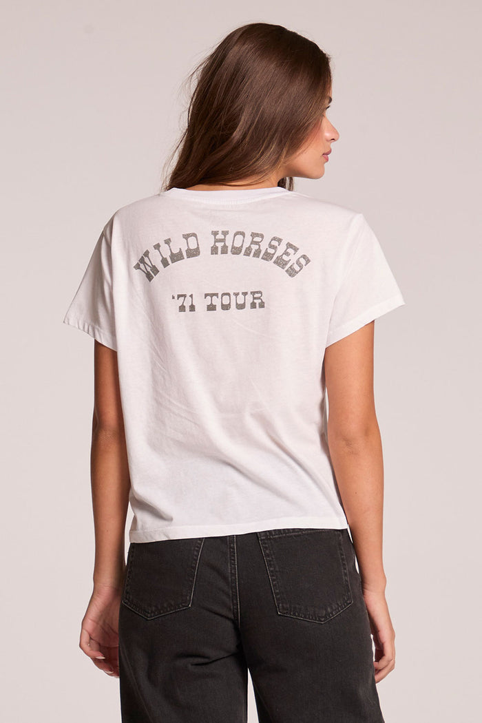 Back view of a woman wearing the Chaser   The Rolling Stones Wild Horses Tee on a neutral background