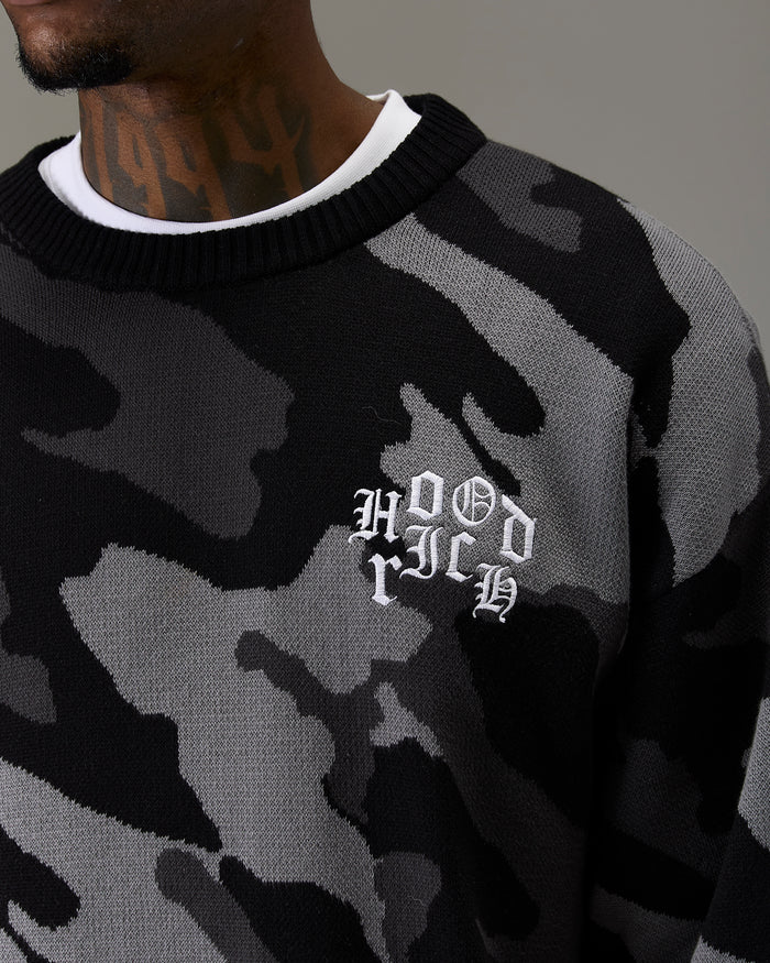 Camouflage sweater with 'Hood Rich' text on a gray background