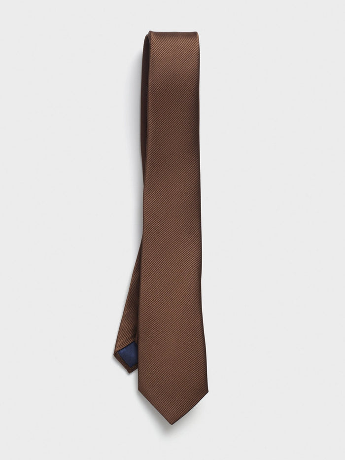 Tobacco silk tie, draped, on white background