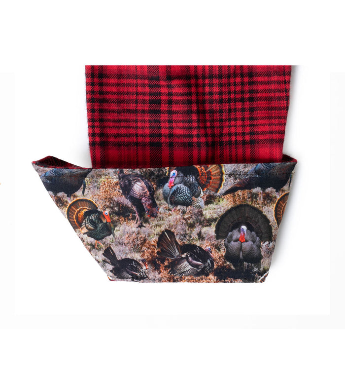The Pladra Toddler Cubs Flannel Shirt in Wrangler Red features a nature print liner with wild turkeys on grass.