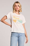 Front view of a woman wearing the Chaser Tom Petty Live at the Whiskey 77 band Tee on a neutral background with one hand on her hip