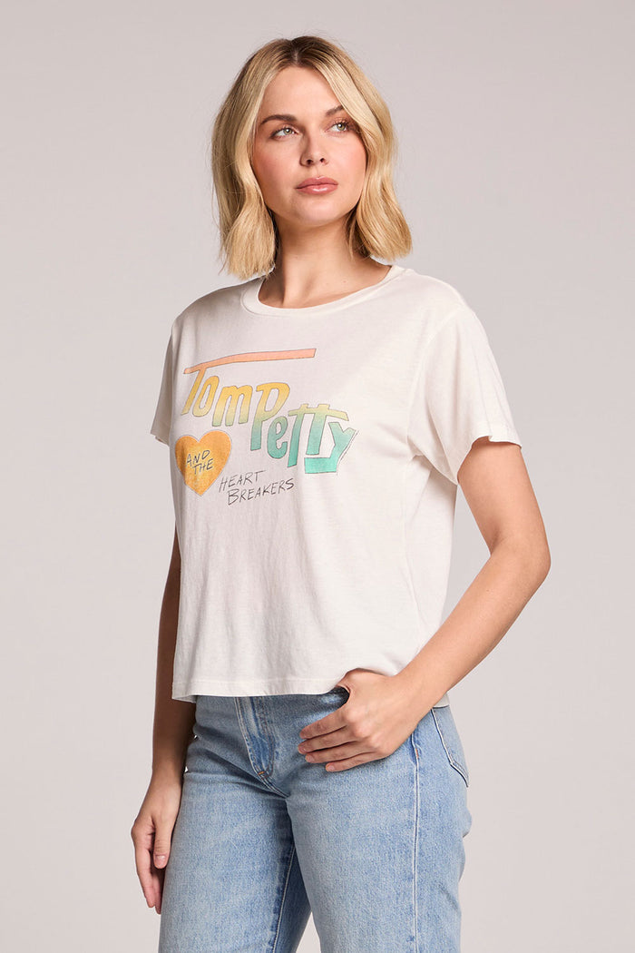 Front view of a woman wearing the Chaser Tom Petty Live at the Whiskey 77 band Tee on a neutral background