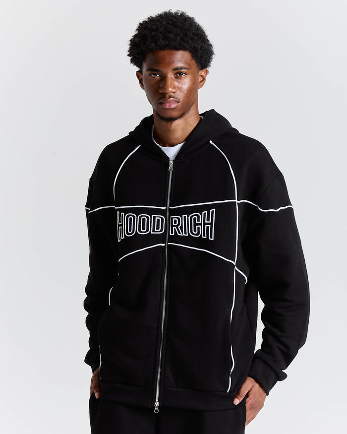 Person wearing a black 'HOODRICH' hoodie on a light gray background