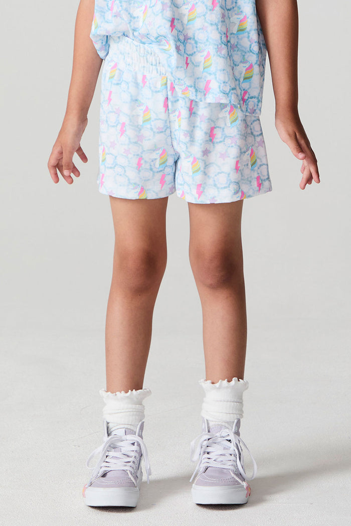 Front view of a girl wearing the Chaser  Unicorn Lightning Skort on a neutral background