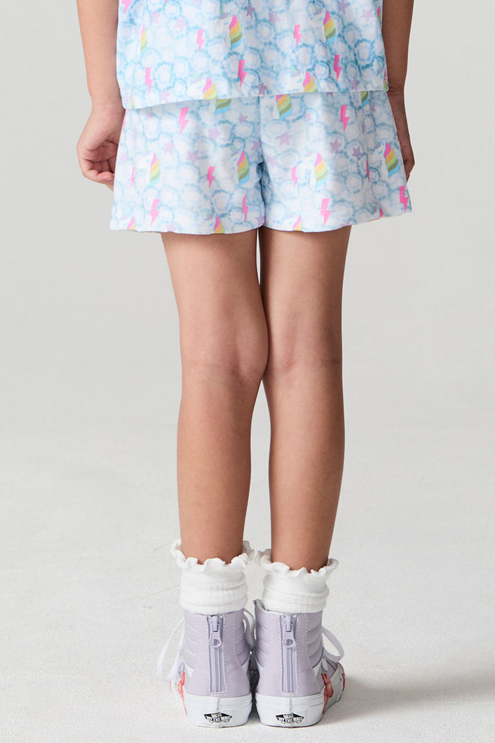 Back view of a girl wearing the Chaser  Unicorn Lightning Skort on a neutral background